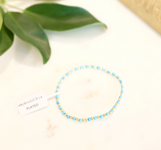 Gold Bead and Blue Stone Bracelet