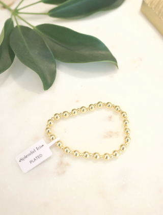 6mm Gold Beaded Bracelet with 3mm Accents